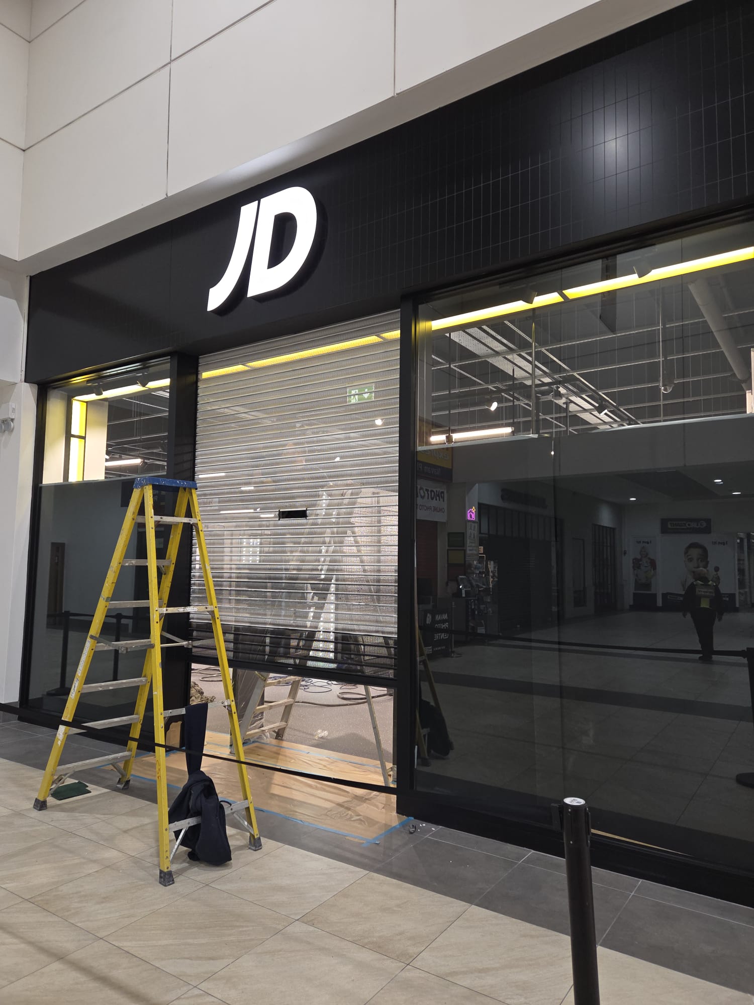 JD Sports Storefront Window & Shutter Spraying project photograph 3