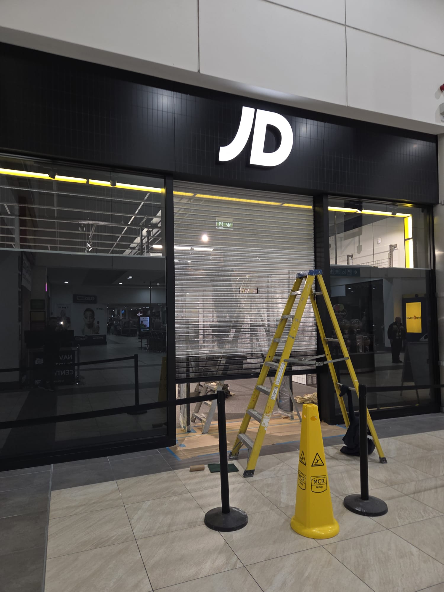 JD Sports Storefront Window & Shutter Spraying project photograph 2